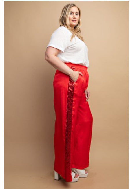 Red satin/sequin pants