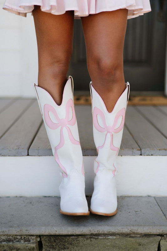 Pink bow boots